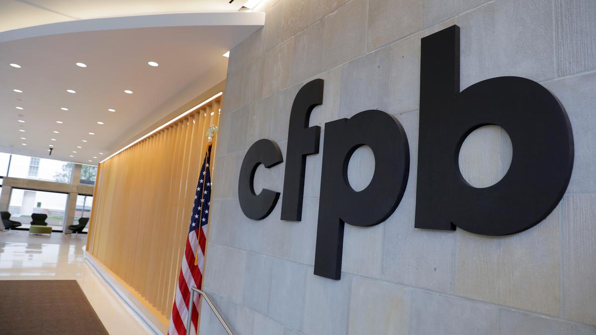 FILE PHOTO: Signage is seen at the Consumer Financial Protection Bureau (CFPB) headquarters in Washington, D.C., U.S., May 14, 2021. REUTERS/Andrew Kelly/File Photo