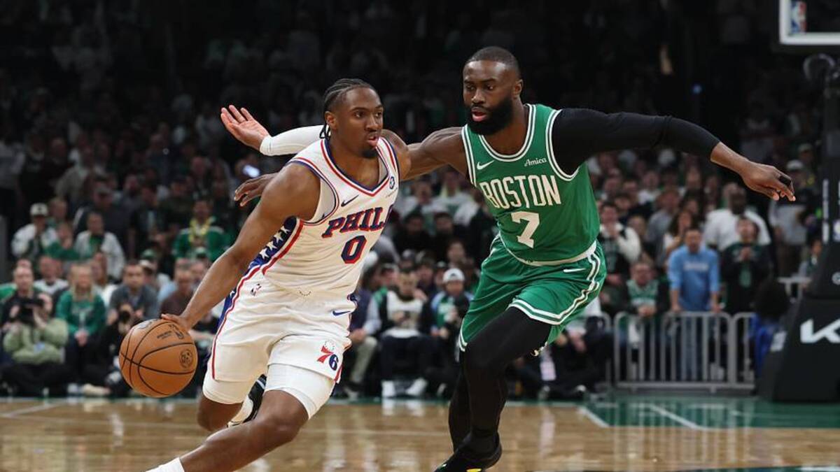  May 2, 2026; Boston, Massachusetts, USA; Philadelphia 76ers guard Tyrese Maxey (0) drives past Boston Celtics guard Jaylen Brown (7) during the first quarter of game seven of the first round of the 2026 NBA Playoffs at TD Garden. Mandatory Credit: Winslow Townson-Imagn Images | Winslow Townson-Imagn Images 