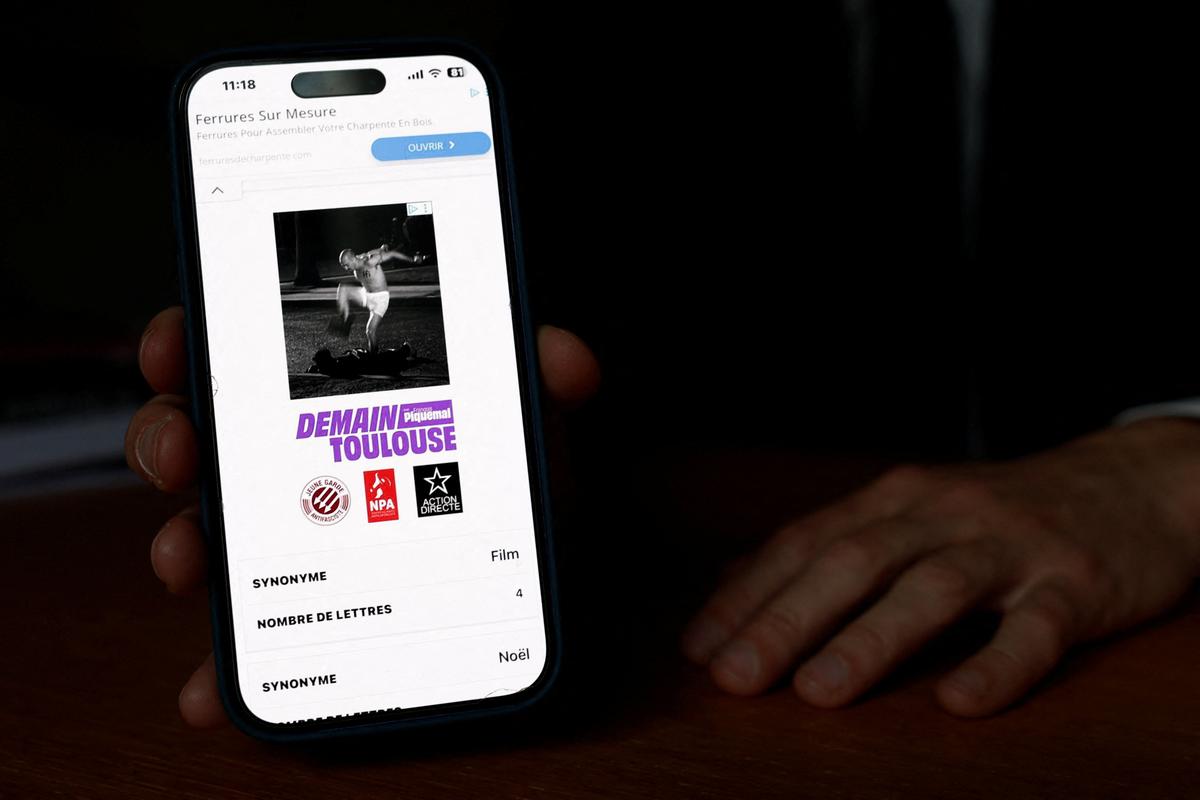 La France Insoumise (France Unbowed - LFI) member of parliament Francois Piquemal shows a screenshot on his mobile phone in his office at the National Assembly in Paris, France, May 5, 2026. REUTERS/Benoit Tessier