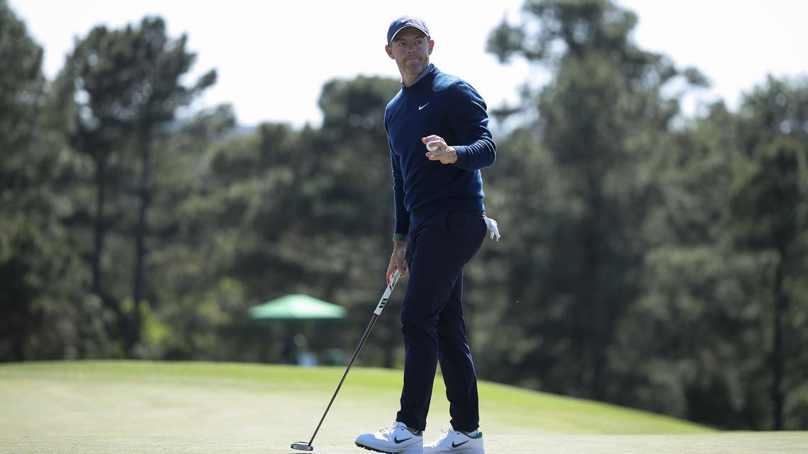 Defending champ Rory McIlroy excels in tough conditions to share Masters lead 