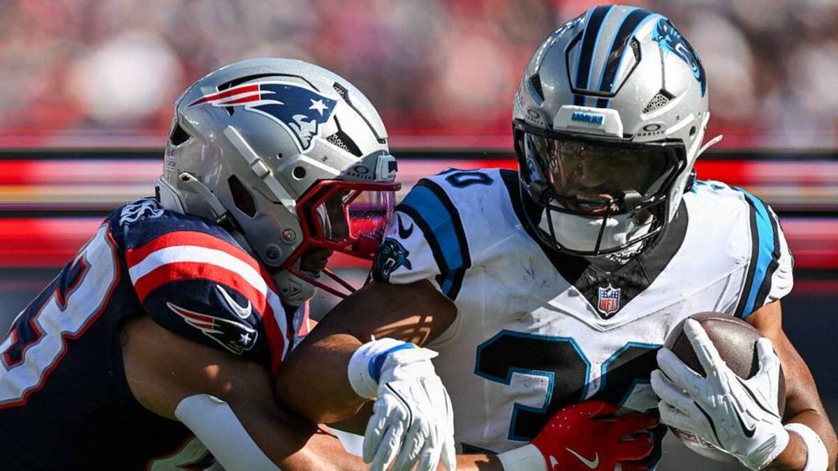  Sep 28, 2025; Foxborough, Massachusetts, USA; New England Patriots linebacker Christian Elliss (53) tackles Carolina Panthers running back Chuba Hubbard (30) during the second half at Gillette Stadium. Mandatory Credit: Brian Fluharty-Imagn Images | IMAGN IMAGES via Reuters Connect 