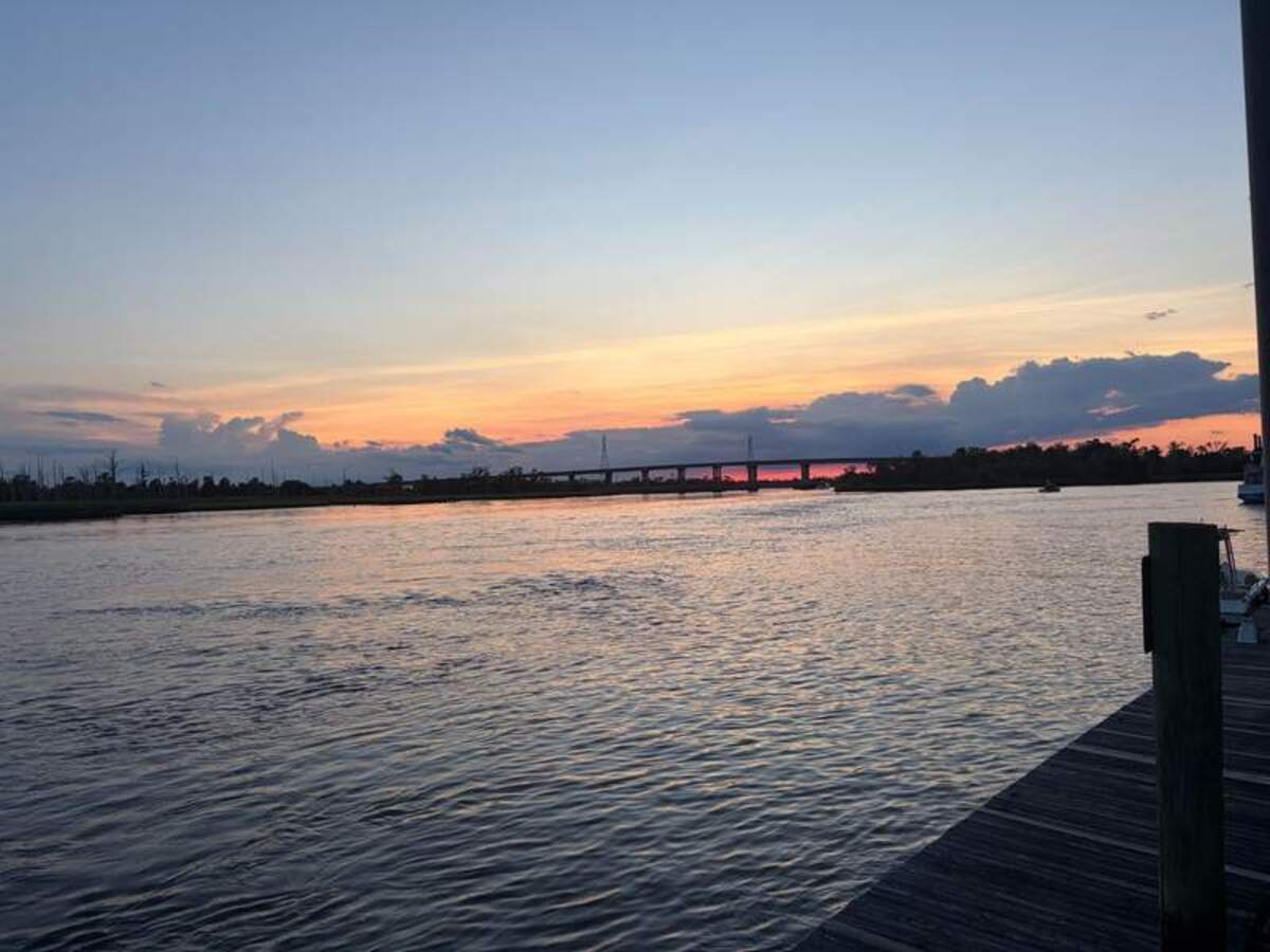  Wilmington quickly stole my heart with its unique blend of city charm and coastal beauty. Catching a sunset stroll along the historic Riverwalk is an absolute must-do for foodie families heading downtown for dinner. Photo credit: Emily Caldwell 