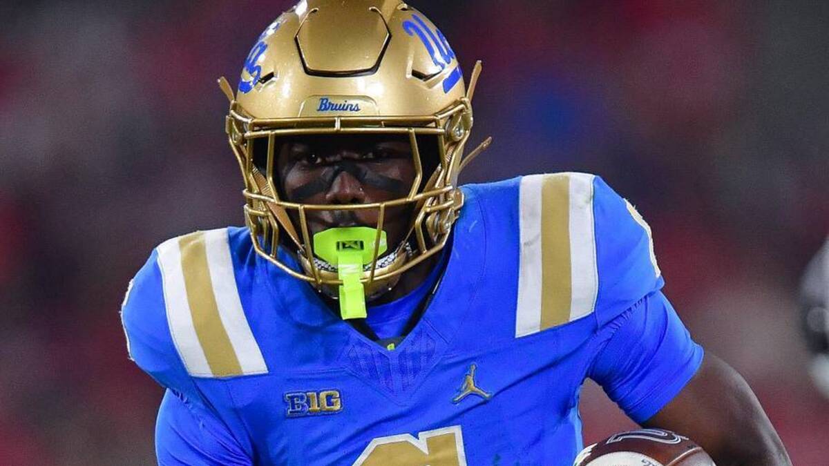  Nov 8, 2025; Pasadena, California, USA; UCLA Bruins running back Anthony Woods (6) runs the ball against the Nebraska Cornhuskers during the second half at the Rose Bowl. Mandatory Credit: Gary A. Vasquez-Imagn Images | Gary A. Vasquez-Imagn Images 