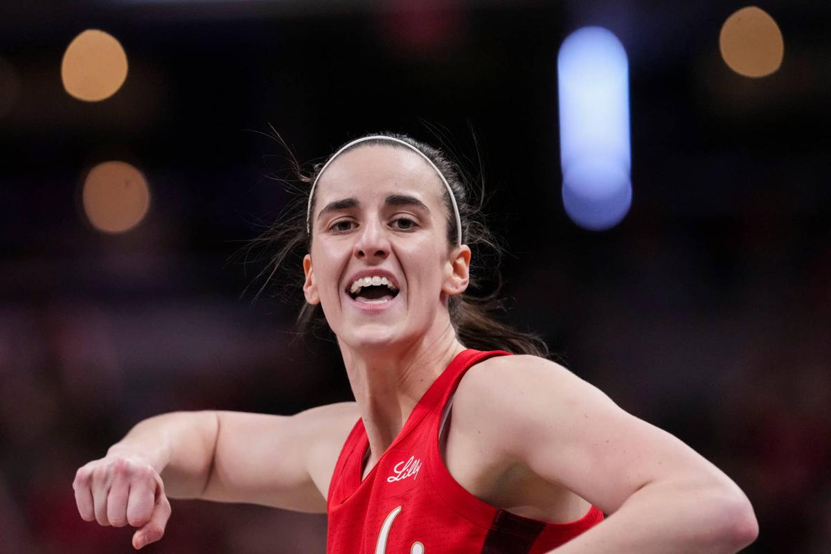  Indiana Fever guard Caitlin Clark (22) celebrates a 3-pointer during a game. Grace Smith/IndyStar / USA TODAY NETWORK via Imagn Images