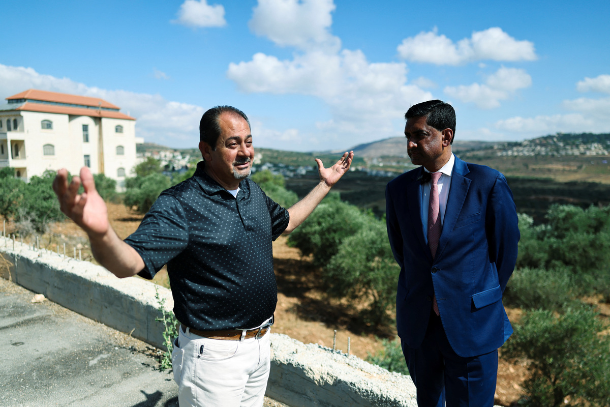 U.S. Representative Ro Khanna (D-CA) speaks with a Palestinian resident of Turmus Ayya, near Ramallah, during a visit in the Israeli-occupied West Bank, July 9, 2026. REUTERS/Ammar Awad