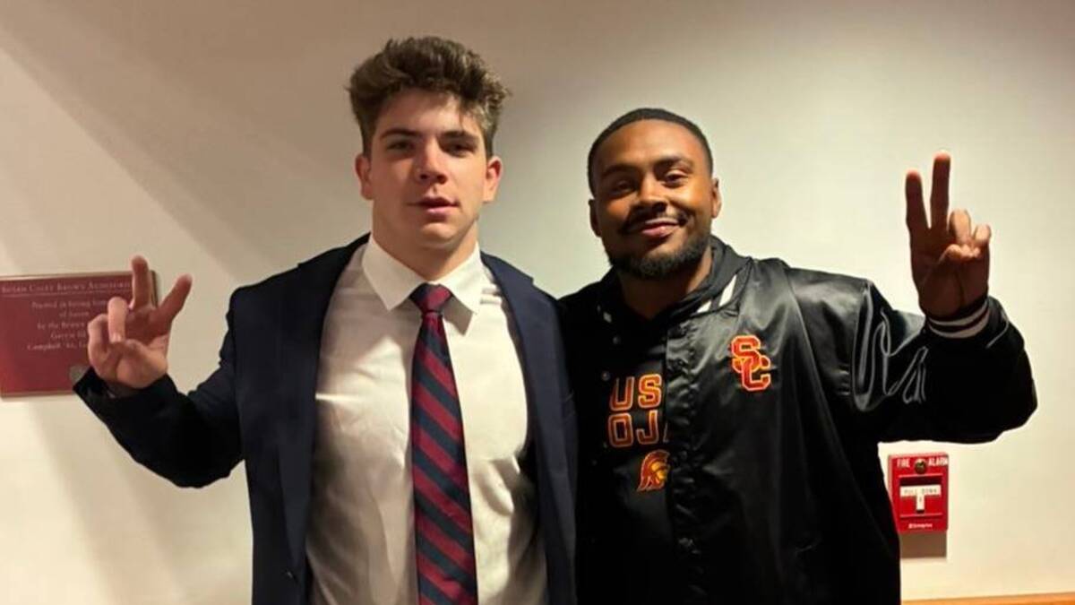  Avon Old Farms (Conn.) 2027 linebacker Dylan Wafle and USC Trojans outside linebackers coach AJ Howard | Photo Courtesy of Dylan Wafle 