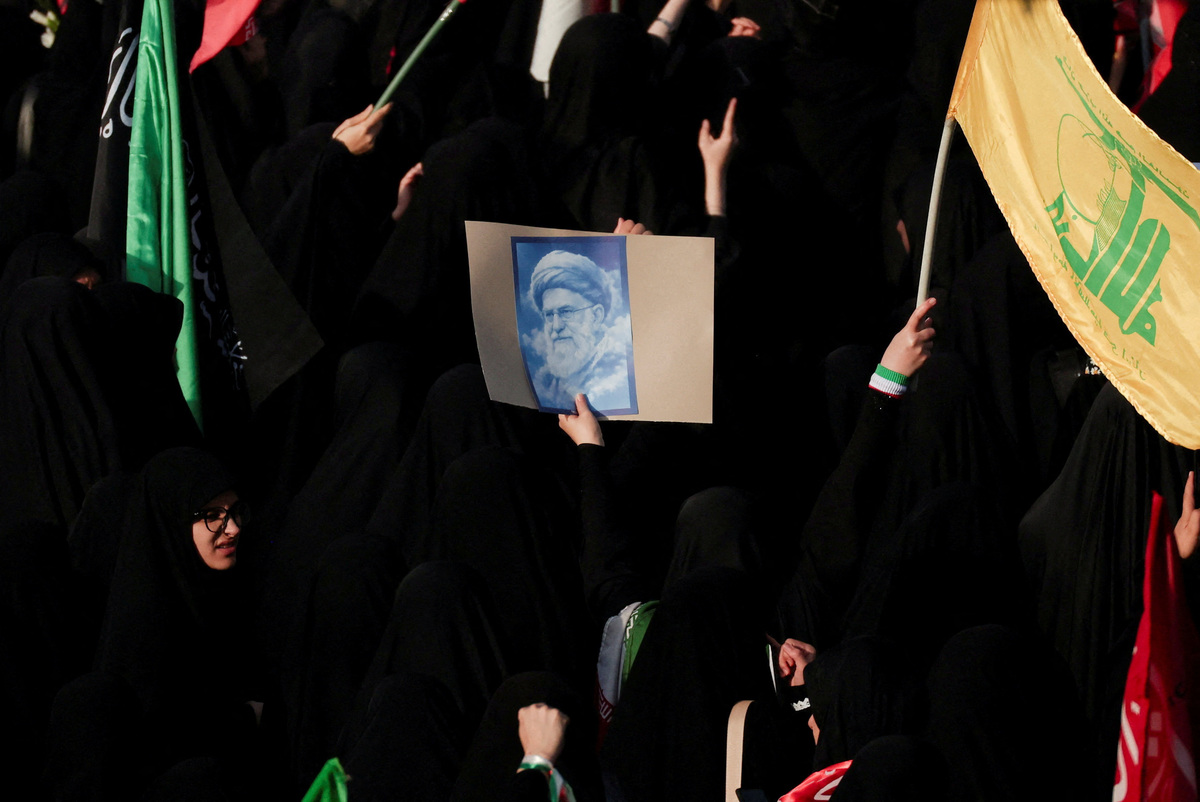 People gather for a public farewell ceremony to pay their respects to late Supreme Leader Ayatollah Ali Khamenei, who was killed on February 28 in Israeli and U.S. airstrikes, at the Imam Khomeini Grand Mosalla, in Tehran, Iran July 4, 2026.  REUTERS/Alkis Konstantinidis