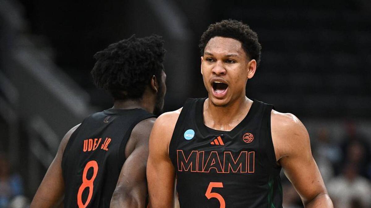 Mar 22, 2026; St. Louis, MO, USA; Miami Hurricanes forward Malik Reneau (5) celebrates with Miami Hurricanes center Ernest Udeh Jr. (8) after a play during the first half against the Purdue Boilermakers during a second round game of the men's 2026 NCAA Tournament at Enterprise Center. Mandatory Credit: Jeff Le-Imagn Images | Jeff Le-Imagn Images 