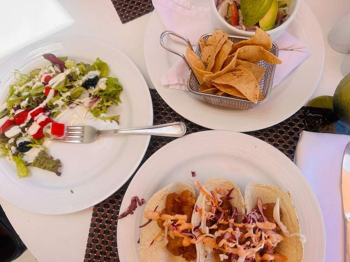  Long beachside lunches at St. Trop became part of the rhythm of my stay at Sandos Cancun, a Cancun all inclusive adults only resort where tacos, ocean views and frozen drinks easily stretched into lazy afternoons. Photo credit: Shelly Peterson. 