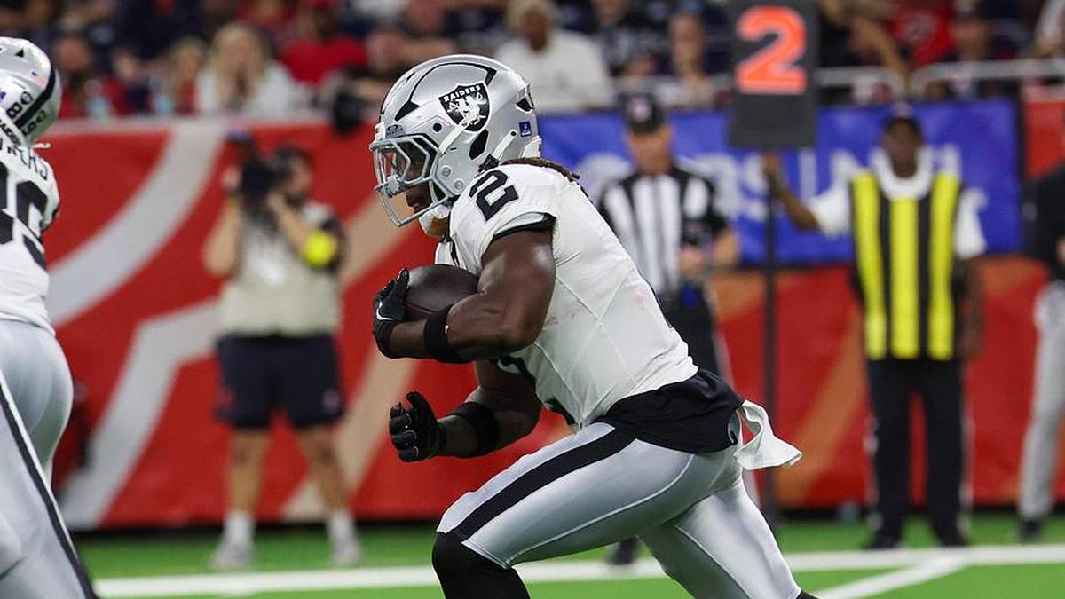  Dec 21, 2025; Houston, Texas, USA; Las Vegas Raiders running back Ashton Jeanty (2) rushes against the Houston Texans in the second half at NRG Stadium. Mandatory Credit: Thomas Shea-Imagn Images | Thomas Shea-Imagn Images 