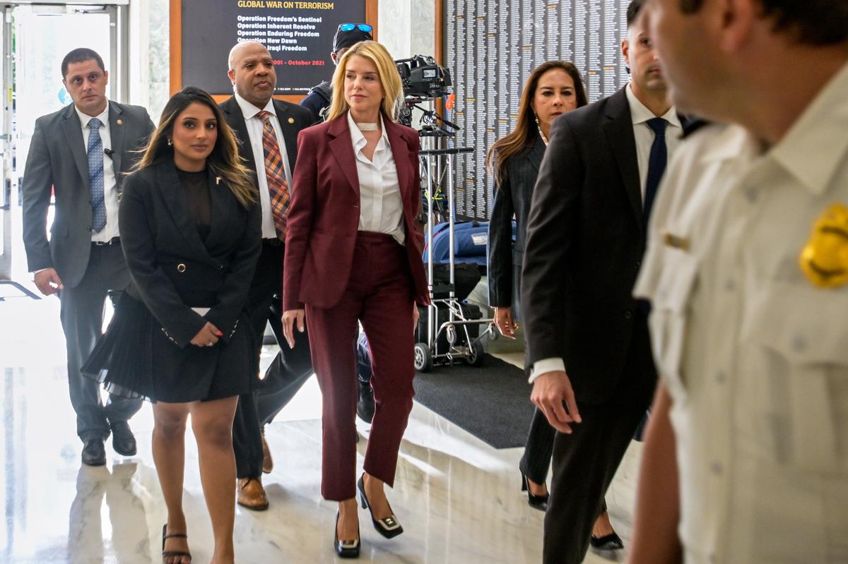  Former Attorney General Pam Bondi, center, arrives for her deposition on Capitol Hill on May 29, 2026. 