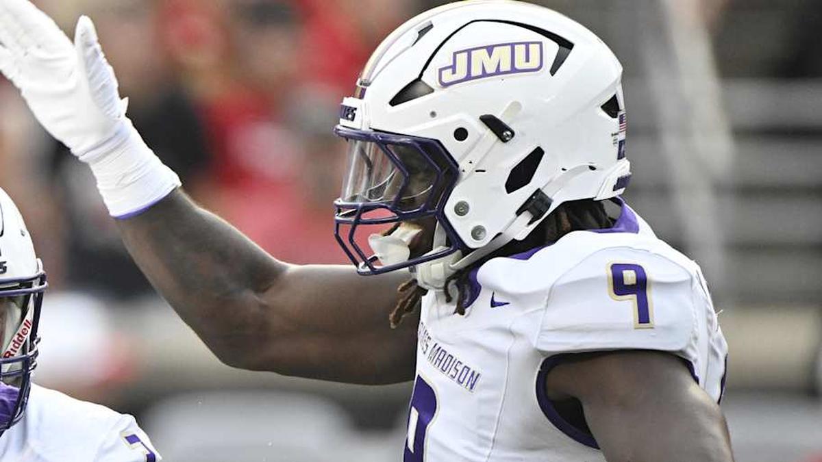  Sep 5, 2025; Louisville, Kentucky, USA; James Madison Dukes linebacker Gannon Weathersby (3) celebrates with safety Jacob Thomas (7) and defensive lineman Xavier Holmes (9) during the first half against the Louisville Cardinals at L&N Federal Credit Union Stadium. Mandatory Credit: Jamie Rhodes-Imagn Images | Jamie Rhodes-Imagn Images 