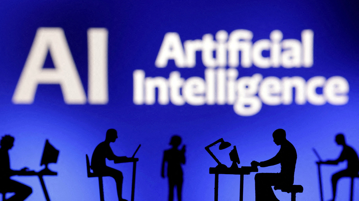 FILE PHOTO: Figurines with computers and smartphones are seen in front of the words "Artificial Intelligence AI" in this illustration taken, February 19, 2024. REUTERS/Dado Ruvic/Illustration/File Photo