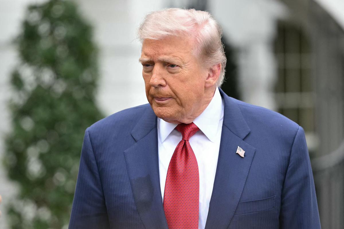  US President Donald Trump speaks to journalists as he makes his way to board Marine One before departing from the South Lawn of the White House in Washington, DC on May 8, 2026. 