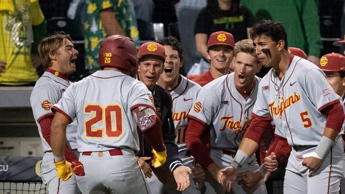  USC celebrates a home run by Isaac Cadena (20) as the Oregon Ducks host the USC Trojans on May 14, 2026, in Eugene, Oregon. | Ben Lonergan/The Register-Guard / USA TODAY NETWORK via Imagn Images 