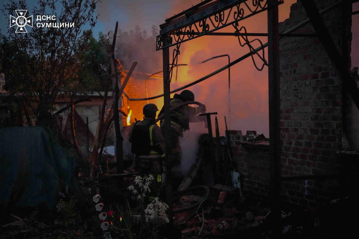 Firefighters work at a site of an apartment building hit by a Russian drone strike, amid Russia's attack on Ukraine, in Sumy, Ukraine in this handout picture released July 3, 2026. Press service of the State Emergency Service of Ukraine in Sumy region/Handout via REUTERS