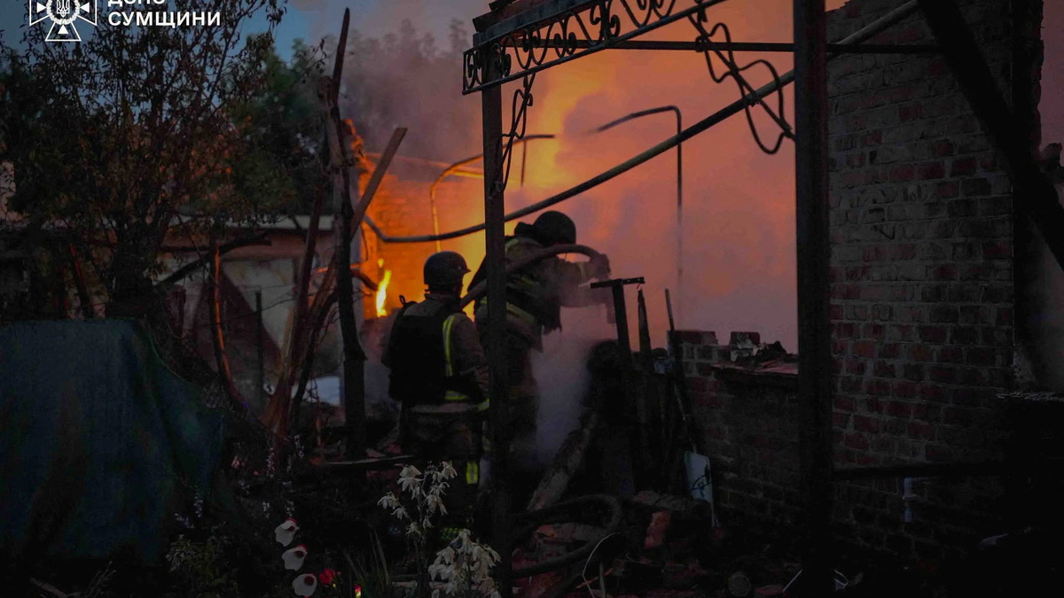 Firefighters work at a site of an apartment building hit by a Russian drone strike, amid Russia's attack on Ukraine, in Sumy, Ukraine in this handout picture released July 3, 2026. Press service of the State Emergency Service of Ukraine in Sumy region/Handout via REUTERS