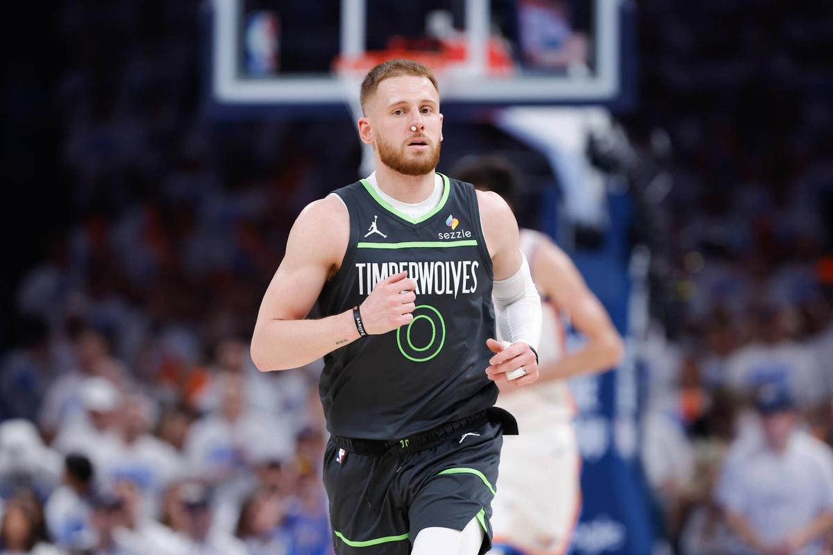  Minnesota Timberwolves guard Donte DiVincenzo (0) Credit: Alonzo Adams-Imagn Images 