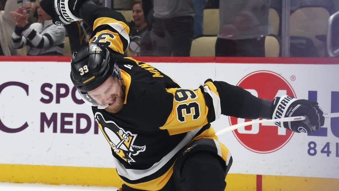 Ascending Penguins overpower slumping Red Wings 
