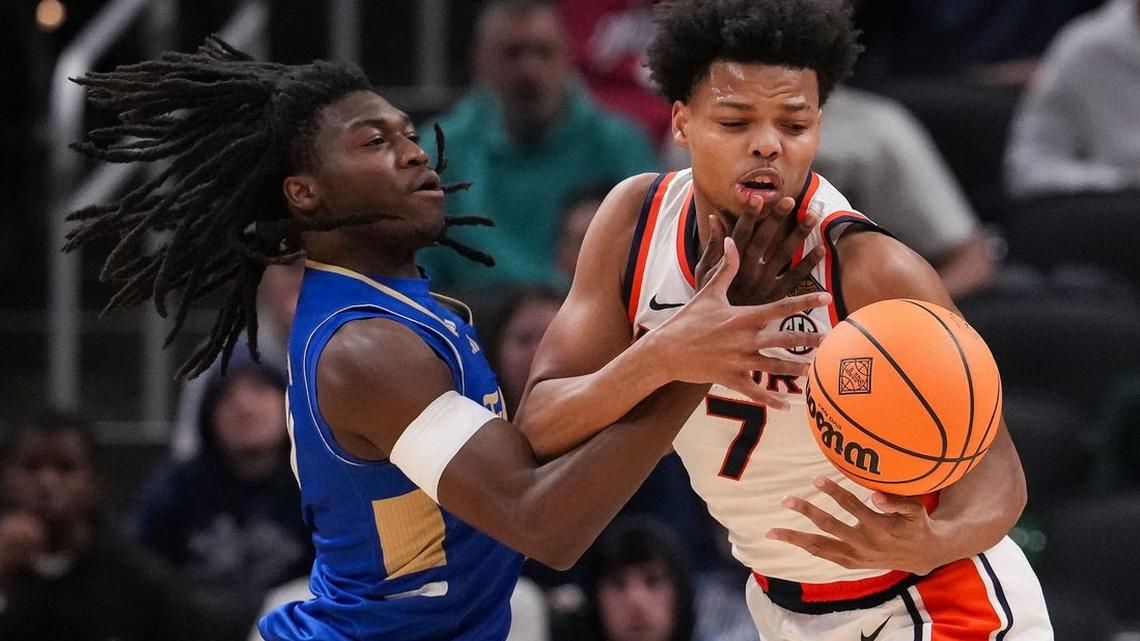 Auburn blows 21-point lead, recovers to beat Tulsa for NIT title 