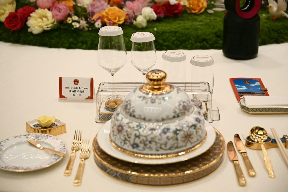  The table setting for U.S. President Donald Trump at a state banquet with China's President Xi Jinping at the Great Hall of the People in Beijing on May 14, 2026. Brendan Smialowski/AFP via Getty Images 