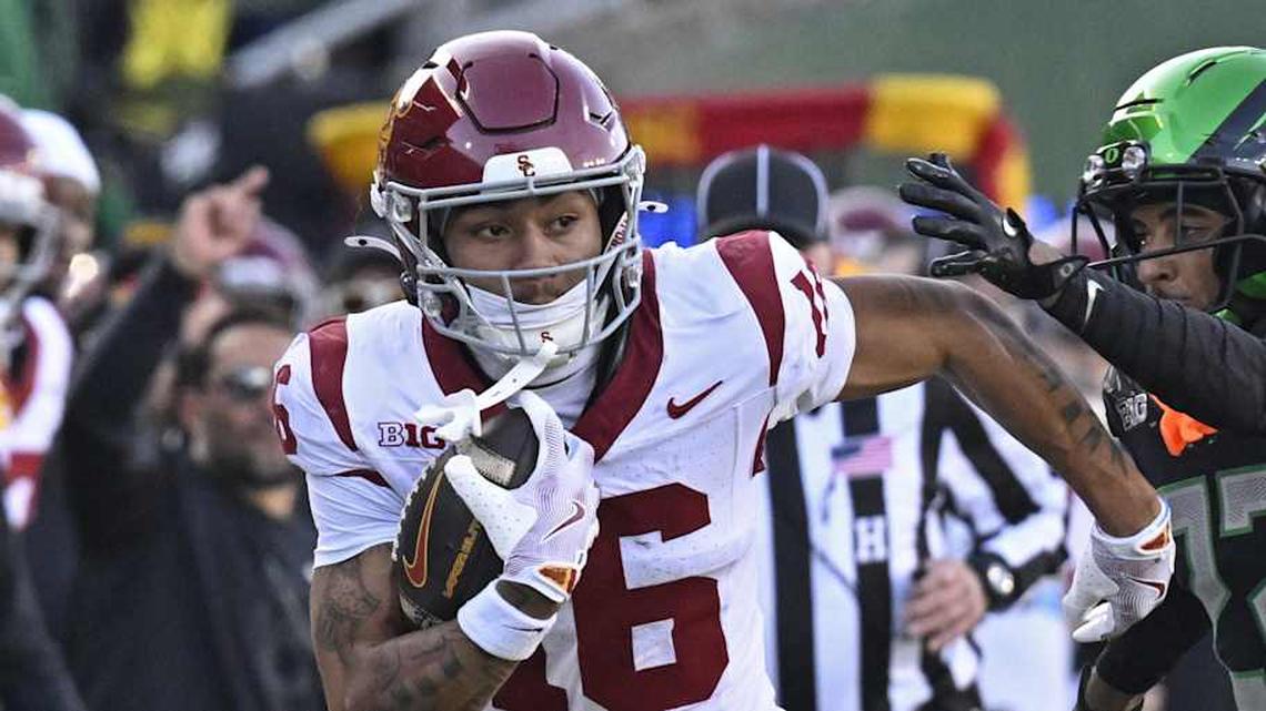  Nov 22, 2025; Eugene, Oregon, USA; Southern California Trojans wide receiver Tanook Hines (16) runs with the ball during the first half against the Oregon Ducks at Autzen Stadium. Mandatory Credit: Troy Wayrynen-Imagn Images | Troy Wayrynen-Imagn Images 