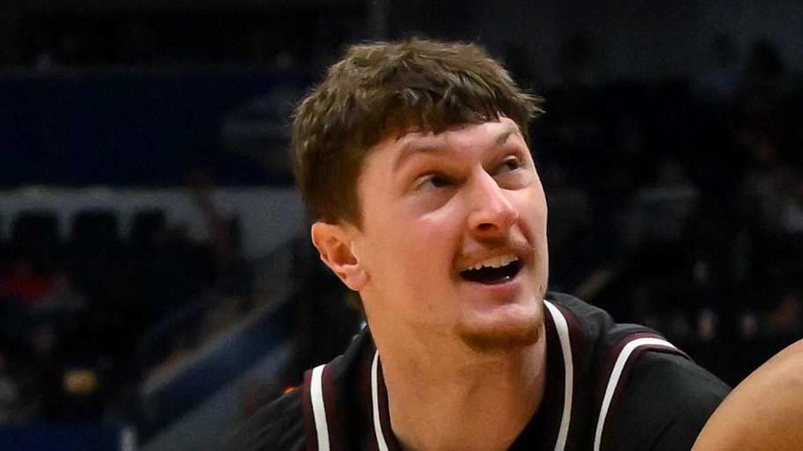  Mar 11, 2026; Nashville, TN, USA; Auburn Tigers guard Keyshawn Hall (7) strips the ball from Mississippi State Bulldogs forward Sergej Macura (11) during the second half at Bridgestone Arena. Mandatory Credit: Steve Roberts-Imagn Images | Steve Roberts-Imagn Images 