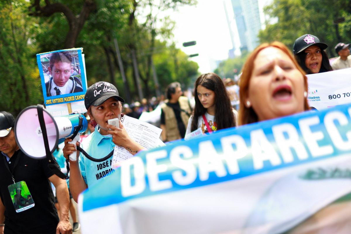 Collectives and families of the disappeared march on Mother's day asking for support in their fight against impunity in Mexico ahead of the 2026 FIFA World Cup, in Mexico City, Mexico May 10, 2026. REUTERS/Raquel Cunha