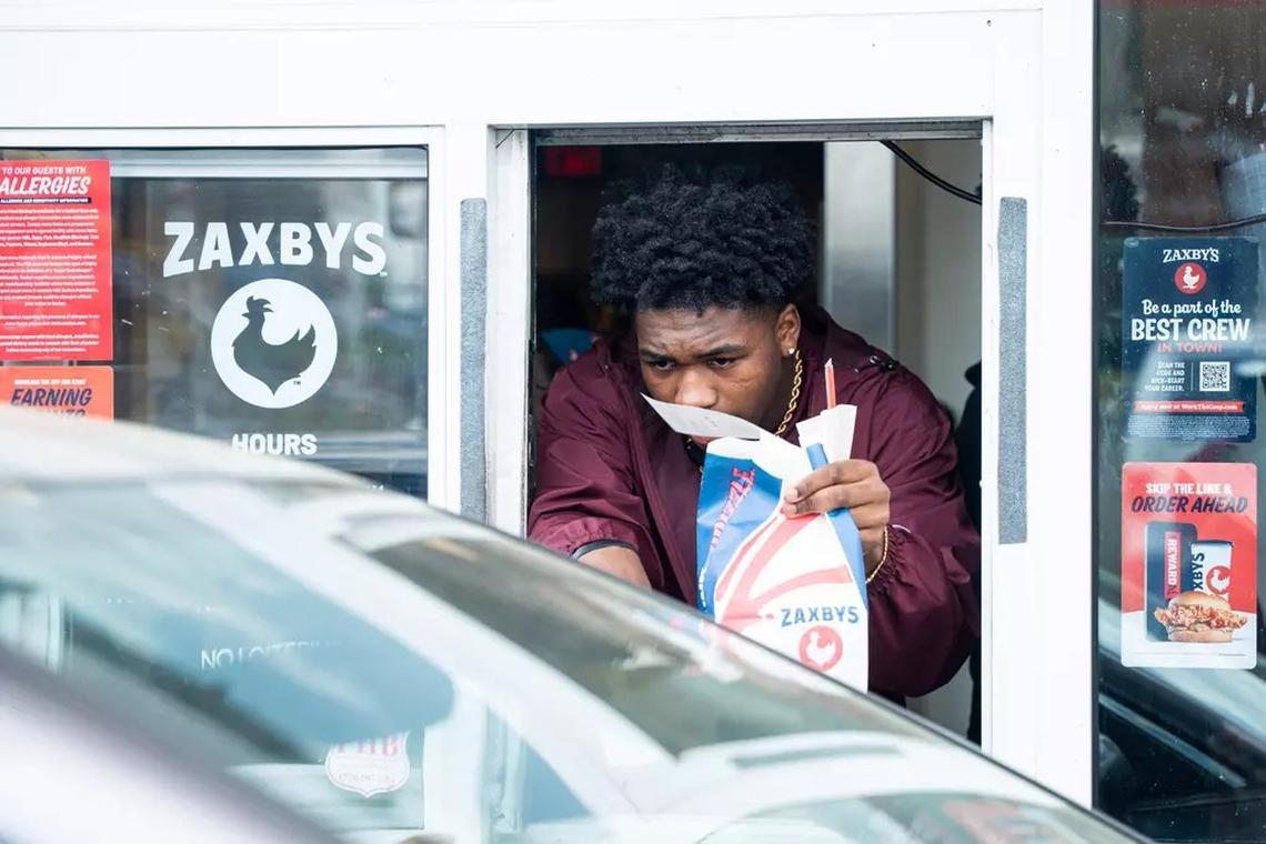  Morehouse student athletes working the drive thru at Zaxby’s in Atlanta (Photo: Isaiah Johnson) 