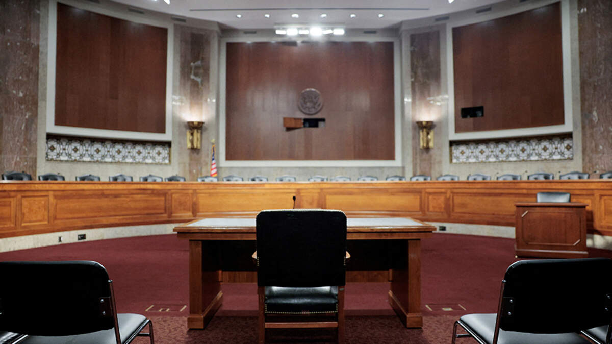 The Senate Intelligence Committee hearing room is empty after a confirmation hearing for Jay Clayton, President Donald Trump’s nominee to be director of national intelligence, was postponed, in Washington on Wednesday. The postponement came amid a growing rift between Trump and Senate Republicans over a number of issues.