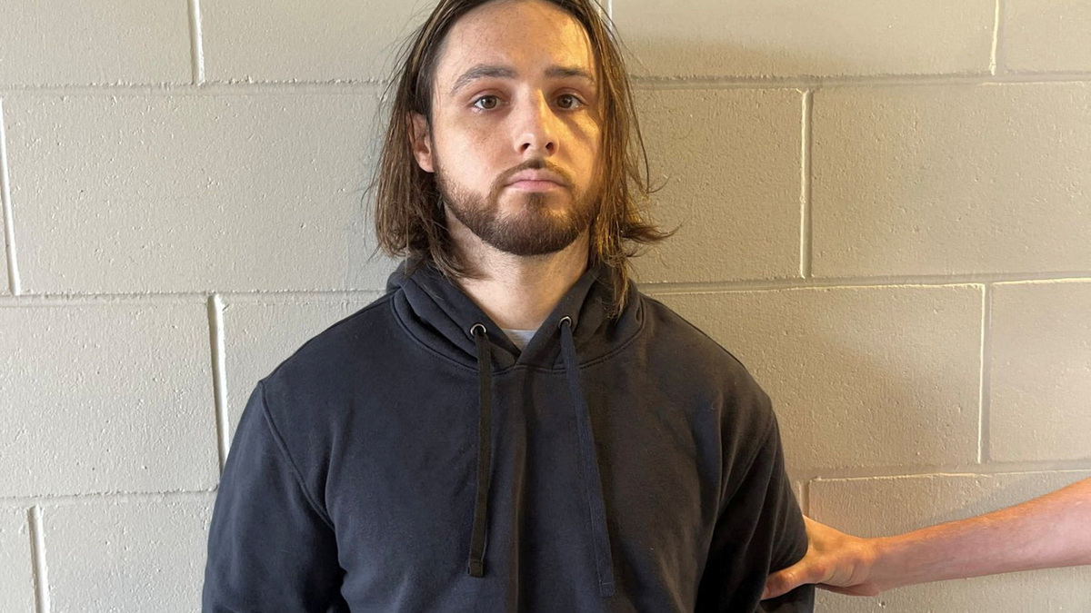 Jonathan Rinderknecht, 29, is posed after his arrest on charges that he intentionally ignited the Pacific Palisades Fire in Los Angeles, before his first court appearance in Orlando, Florida, U.S. October 8, 2025.  Department of Justice/Handout via REUTERS