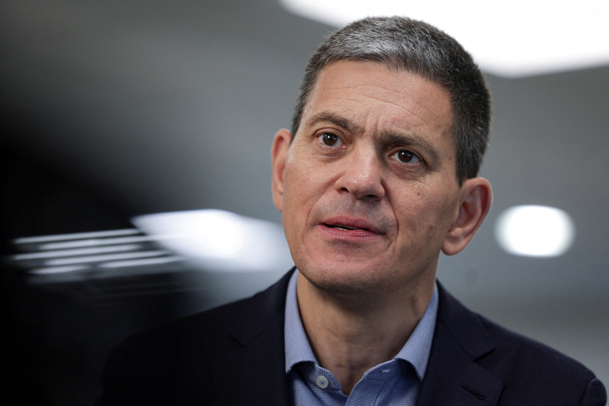 FILE PHOTO: International Rescue Committee chief David Miliband speaks during an interview in New York City, U.S., September 18, 2025. REUTERS/Jeenah Moon/File Photo