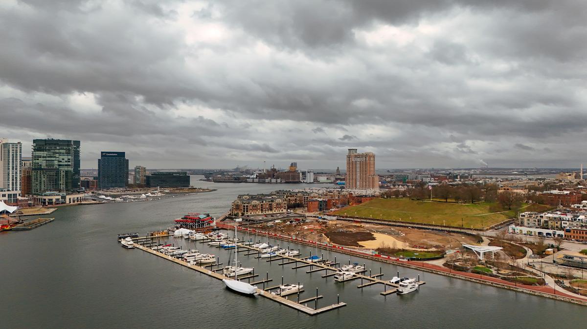 Dark clouds gather over Inner Harbor as unsettled weather moves into the Baltimore area. (Kevin Richardson/Baltimore Sun/TNS)
