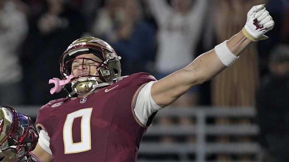  Nov 1, 2025; Tallahassee, Florida, USA; Florida State Seminoles quarterback Tommy Castellanos (1) celebrates a touchdown with wide receiver Duce Robinson (0) during the second half against the Wake Forest Demon Deacons at Doak S. Campbell Stadium. Mandatory Credit: Melina Myers-Imagn Images | Melina Myers-Imagn Images 