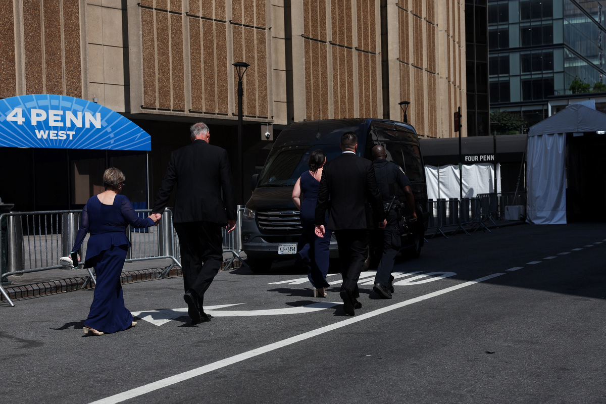 Guests walk down closed street, ahead of the reported wedding celebrations of singer Taylor Swift and National Football League (NFL) player Travis Kelce, in New York, U.S., July 3, 2026.  REUTERS/Shannon Stapleton