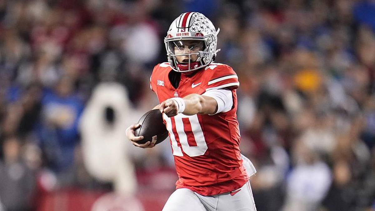  Ohio State Buckeyes quarterback Julian Sayin (10) runs during the NCAA football game against the UCLA Bruins at Ohio Stadium in Columbus on Nov. 15, 2025. | Adam Cairns/Columbus Dispatch / USA TODAY NETWORK via Imagn Images 