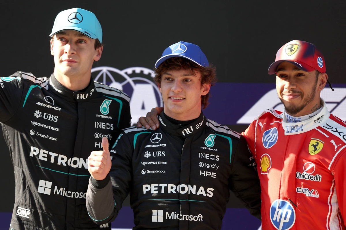  Pole position qualifier Kimi Antonelli, second-placed qualifier George Russell, and third-placed qualifier Lewis Hamilton at the 2026 F1 Chinese Grand Prix qualifying. Dom Gibbons/LAT Images