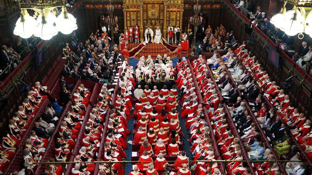 Britain's King Charles III sits besides Queen Camilla during the State Opening of Parliament at the Palace of Westminster in London, Wednesday, May 13, 2026.    Kirsty Wigglesworth/Pool via REUTERS