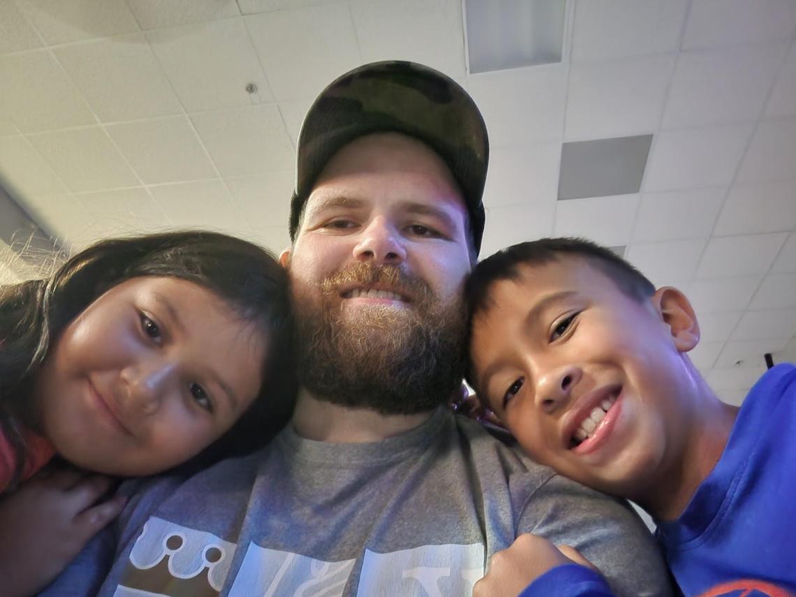  Jarrod Toothman with his children, Lilyana (left) and Elias (right) in 2022. (Photo courtesy of the author) 