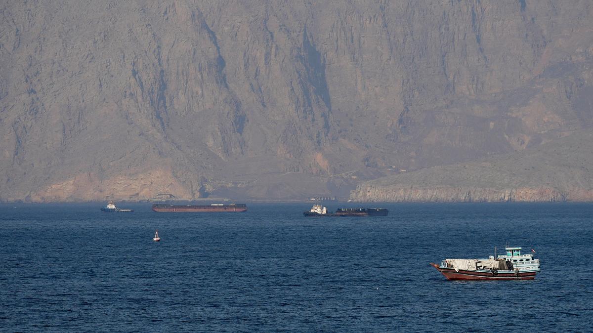 FILE PHOTO: Ships and tankers in the Strait of Hormuz off the coast of Musandam, Oman, April 18, 2026. REUTERS/Stringer REFILE - QUALITY REPEAT/File Photo