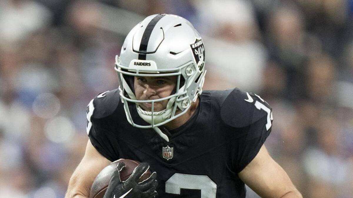  November 5, 2023; Paradise, Nevada, USA; Las Vegas Raiders wide receiver Hunter Renfrow (13) is tackled by New York Giants cornerback Cor'Dale Flott (28) during the second quarter at Allegiant Stadium. Mandatory Credit: Kyle Terada-Imagn Images | Kyle Terada-Imagn Images 