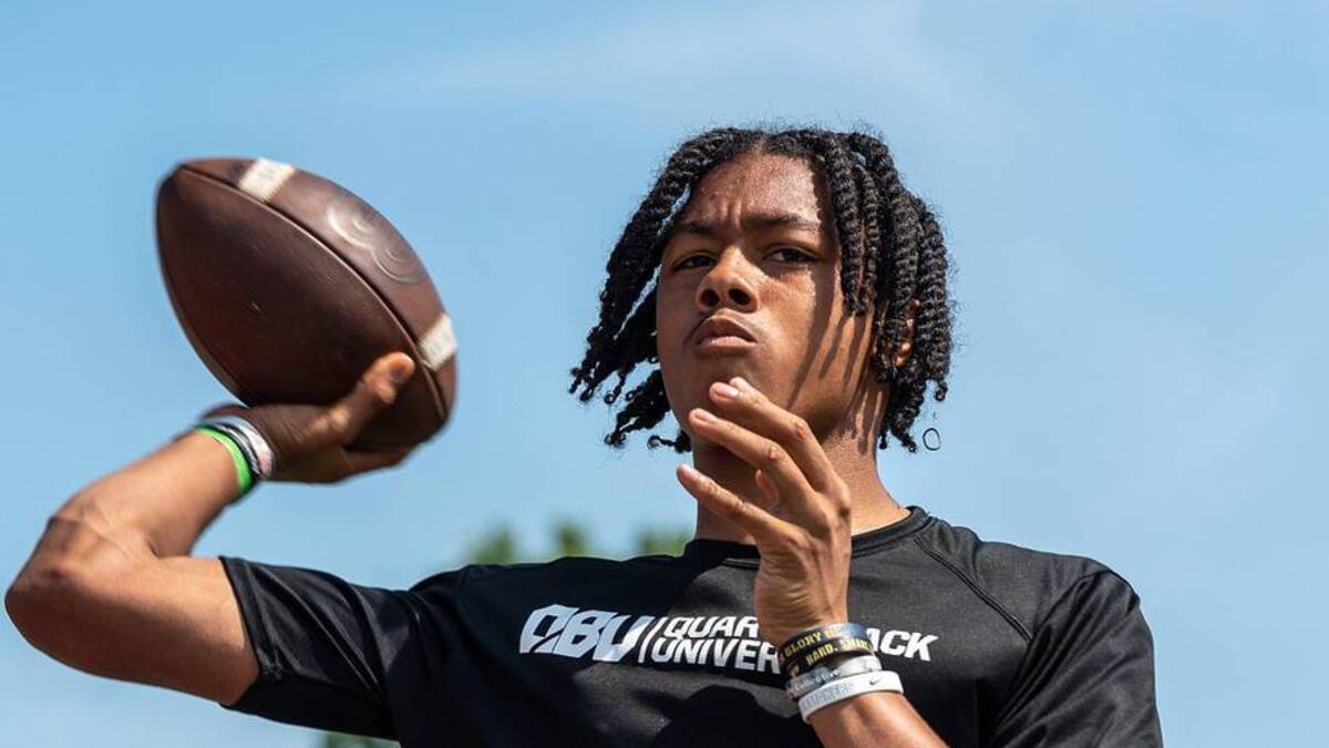 Donald Tabron II, 16, a quarterback at Cass Technical High School, throws a football during a private workout in Detroit on Saturday, June 21, 2025. | David Rodriguez Munoz / USA TODAY NETWORK via Imagn Images 