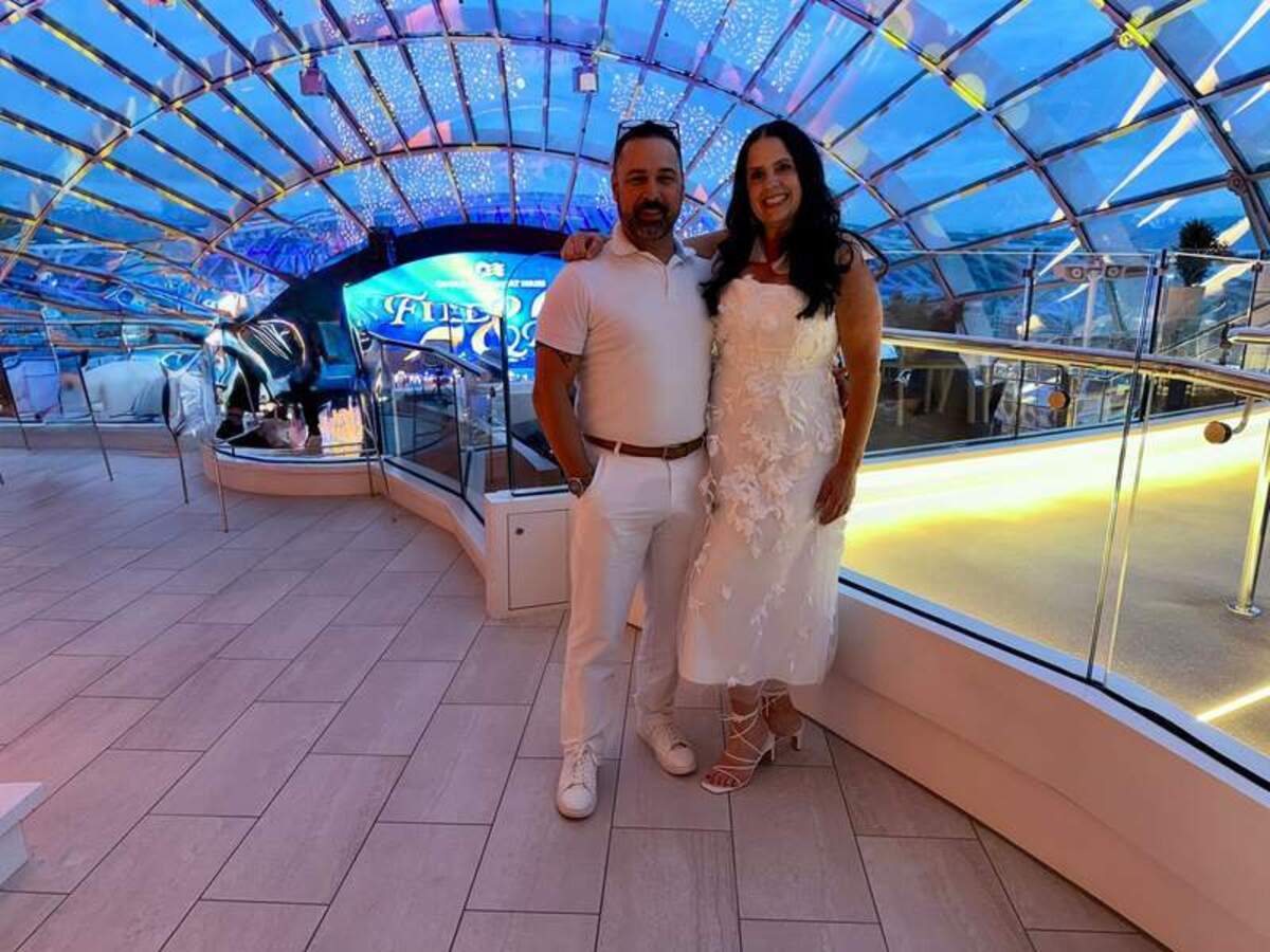  Dressed up for ‘white night’ at the Candlelight Concert Series, with reflection of the candles on the ceiling above. Photo credit: Emily Molina 