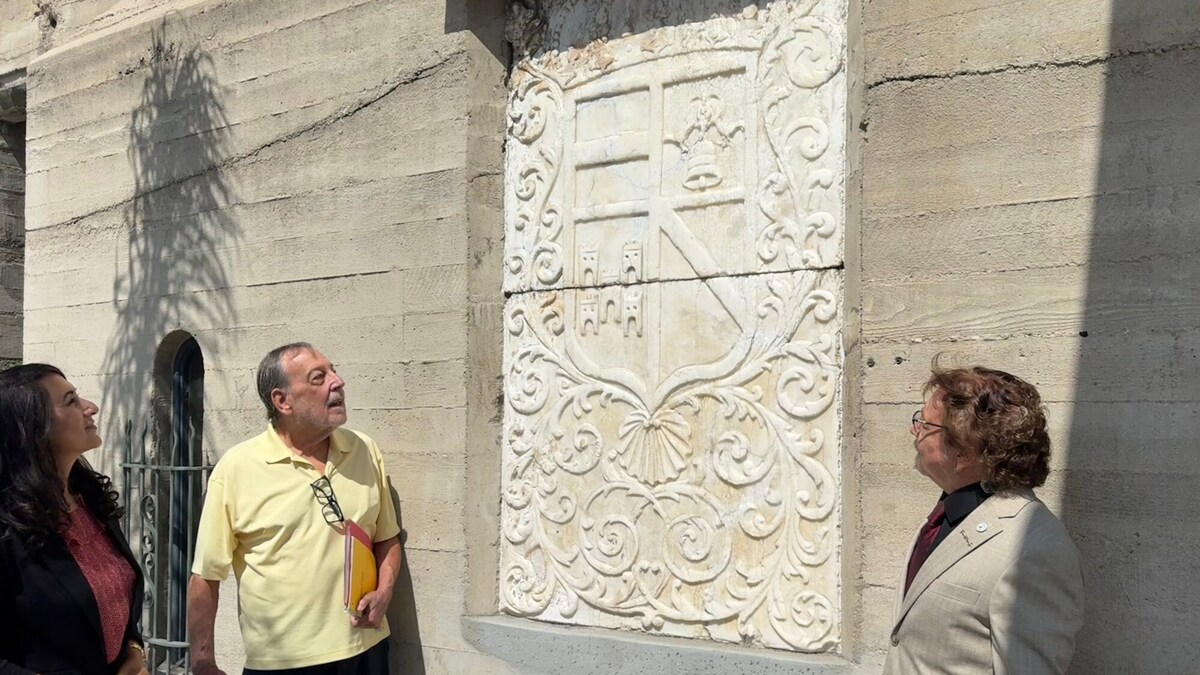 Homa Aimen, left, Jeff Crumbaker and Glenn Scalise admire the 17th century marble escutcheon restored by their efforts at Riverside’s Mission Inn. Friends of the Mission Inn, a nonprofit, funded the $10,000 repair. Since 1969, Friends has raised $5 million to preserve the hotel’s art and artifacts. (Photo by David Allen, Inland Valley Daily Bulletin/SCNG)