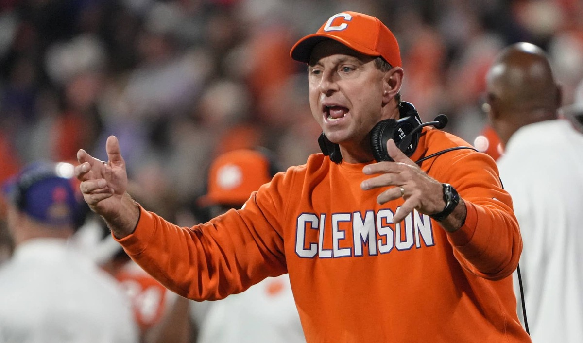  Nov 8, 2025; Clemson, South Carolina, USA; Clemson Tigers head coach Dabo Swinney communicates with players in the game against the Florida State Seminoles during the second quarter at Memorial Stadium. Mandatory Credit: Ken Ruinard - GREENVILLE NEWS-USA TODAY Network via Imagn Images 