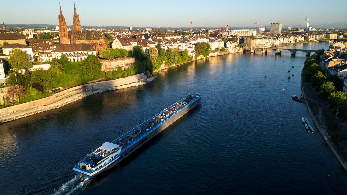 A drone view shows a barge on the Rhine river in front of the Muenster cathedral ahead of the Eurovision Song Contest in Basel, Switzerland, May 1, 2025. REUTERS/Denis Balibouse