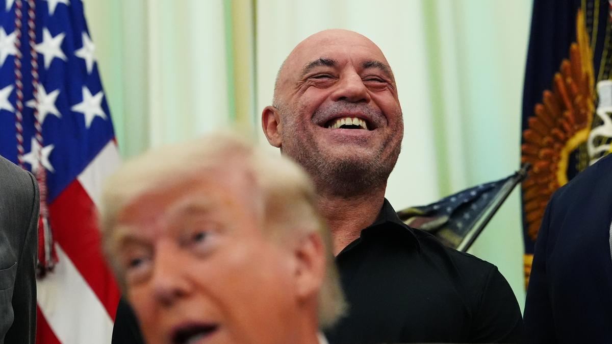 Joe Rogan. Joe Rogan laughs as President Donald Trump speaks in the Oval Office of the White House on April 18, 2026, in Washington. 