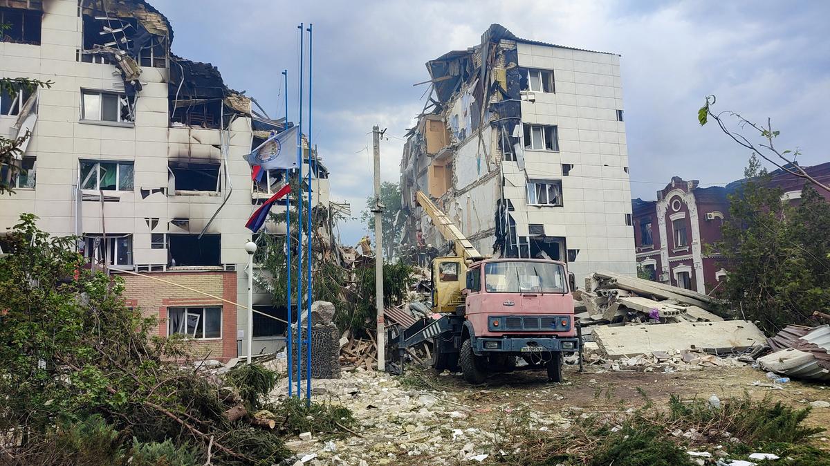 Rescuers work amid debris of a destroyed dormitory building of the Starobilsk College of Luhansk Pedagogical University following an overnight attack, what Russian-installed authorities called a Ukrainian drone strike, in the course of the Russia-Ukraine conflict in the town of Starobilsk (Starobelsk) in the Luhansk region, a Russian-controlled area of Ukraine, May 22, 2026. Picture taken with a mobile phone. REUTERS/Pavel Klimov
