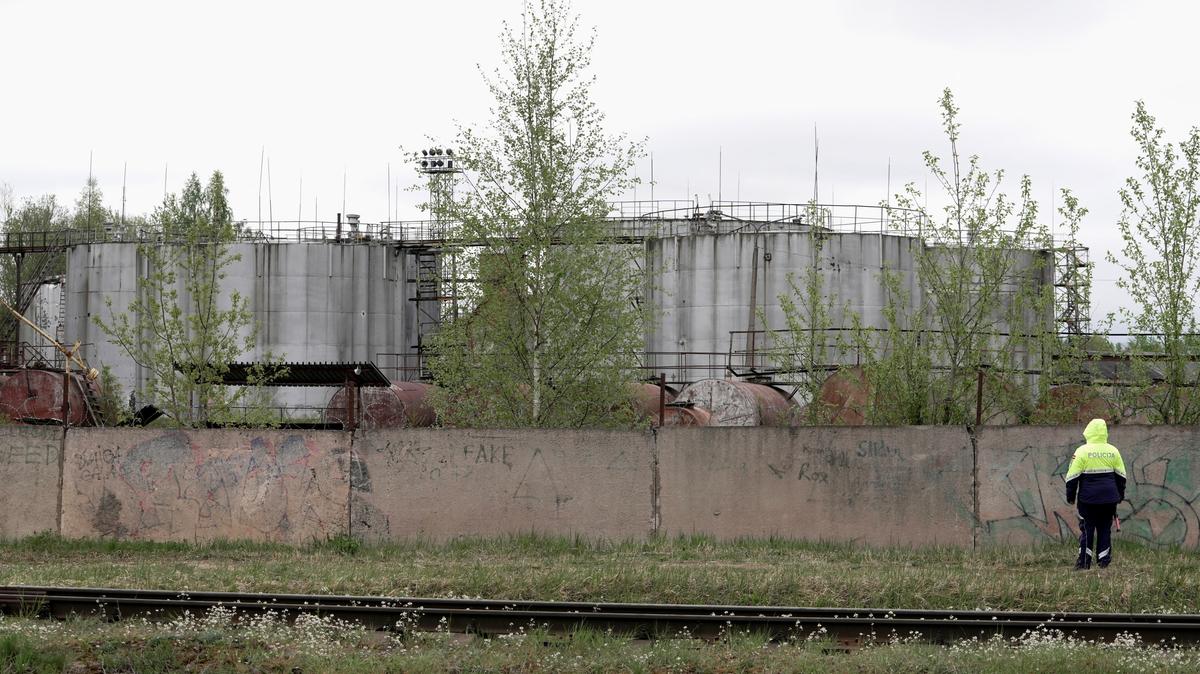 Oil tanks at the site where drones crashed at a storage facility in Rezekne, Latvia, May 7, 2026. REUTERS/Janis Laizans