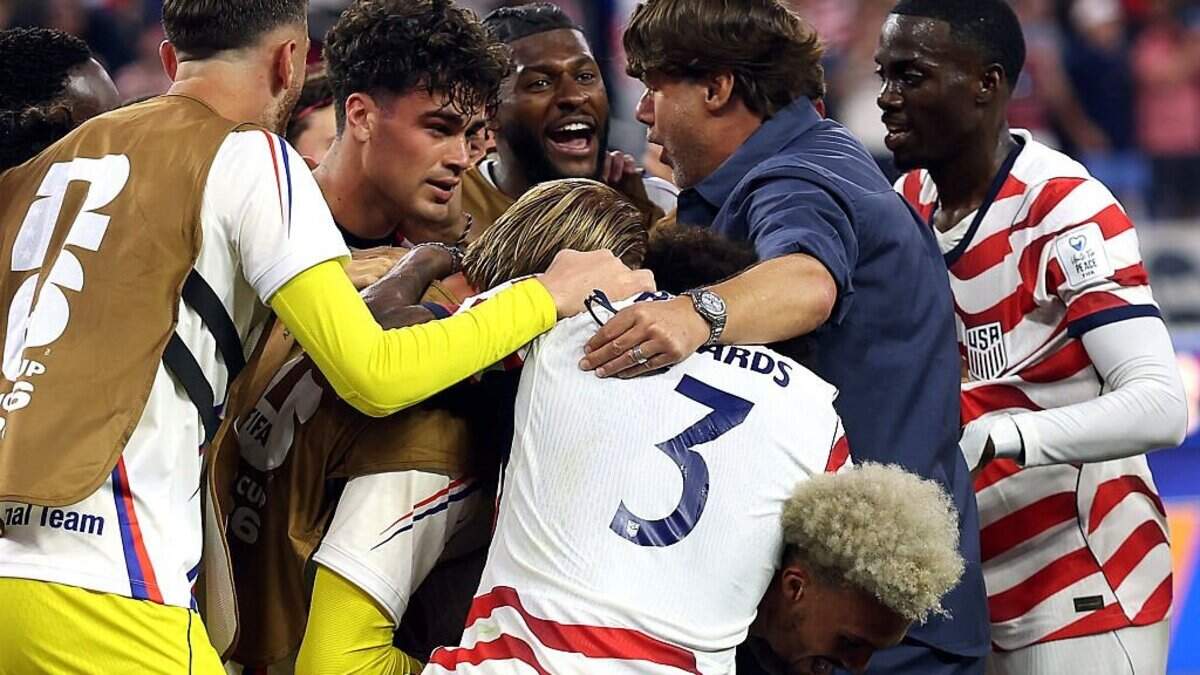 U.S. Men’s National Team coach Mauricio Pochettino, right, celebrates with his team after Giovanni Reyna scored the final goal in the team's victory over Paraguay in the FIFA World Cup 2026 Group D match on June 12 at Los Angeles Stadium.